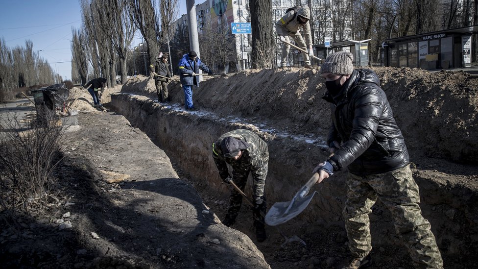 Trenches are prepared by the side of the road in Kyiv, 10 March 2022.