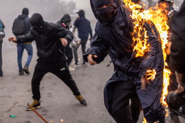 Участники беспорядков в Сантьяго 